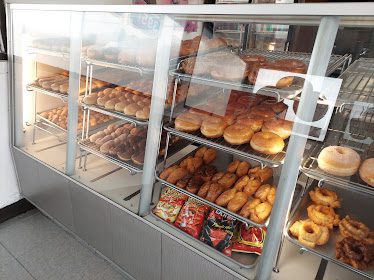 Howard's Donuts & Deli — Restaurant Food And Dining Photo