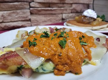 Fort Blossom Cafe Bar & Grill — Restaurant Food And Dining Photo