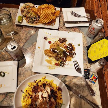 Odyssey Gastropub — Restaurant Food And Dining Photo