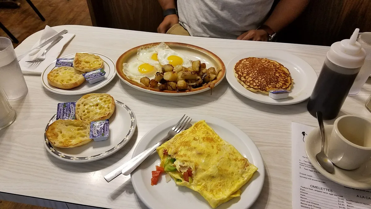 Proud Rooster Restaurant: Restaurant Food And Dining Photo